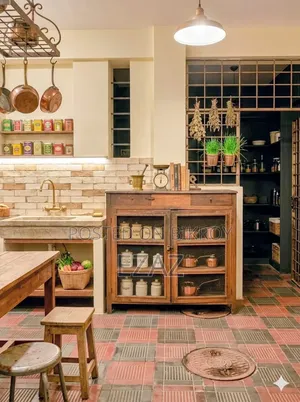 A teak wood kitchen cupboard will be sold.
