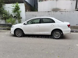 টয়োটা অ্যাক্সিও ১.৫ এক্স এইচআইডি টু-ডব্লিউডি ২০১২ সাদা