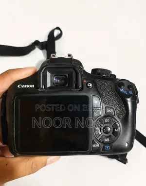 ক্যানন ১২০০ডি ৭৫-৩০০মিমি জুম লেন্স