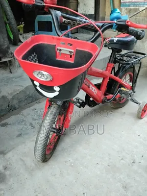 Wonderful and attractive red space baby kids bicycle with basket.
