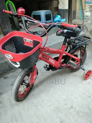 Wonderful and attractive red space baby kids bicycle with basket.