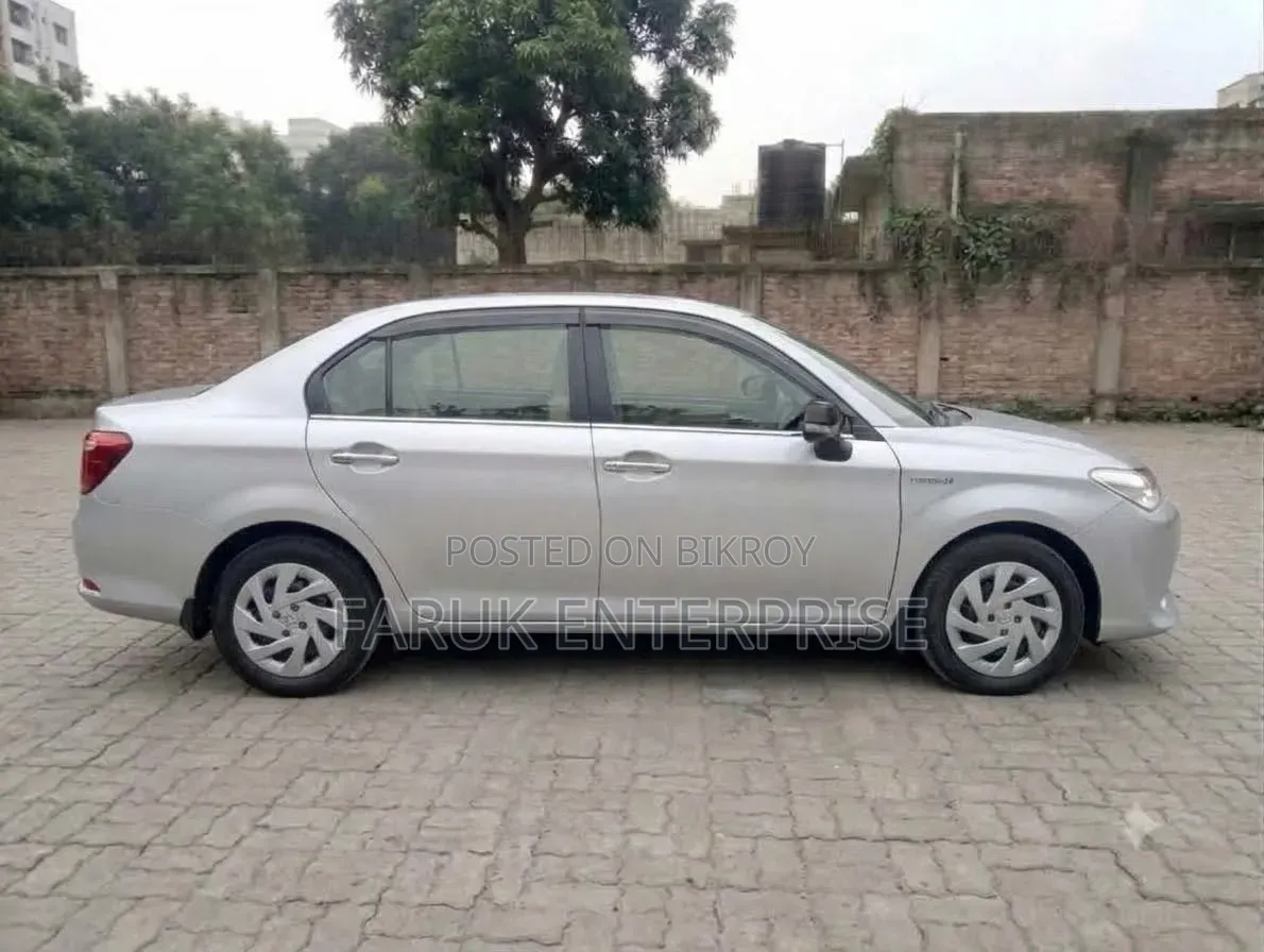 টয়োটা এক্সিও ২০১৫ সিলভার