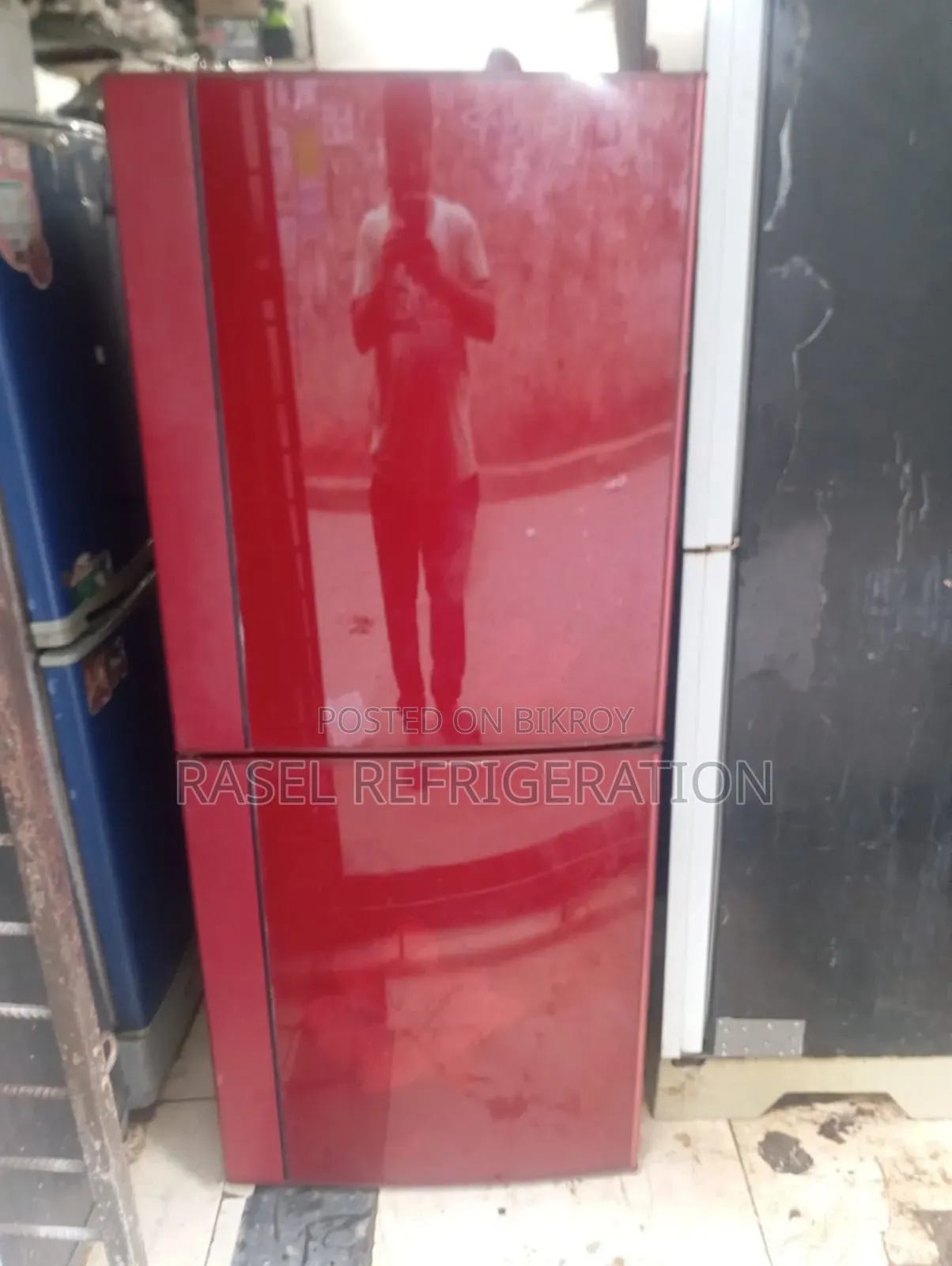 265-liter running fridge for sale.