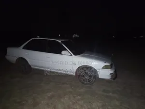 টয়োটা করোল্লা ১৯৯৩ সাদা