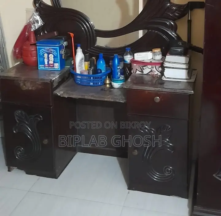 ড্রেসিং টেবিল উইথ টু ড্রয়ার্স এন্ড টু কেবিনেটস।