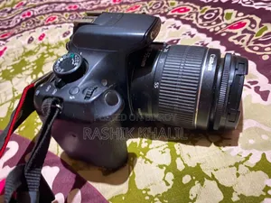ডিএসএলআর ক্যামেরা ক্যানন ১২০০ডি