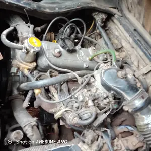 টয়োটা কোয়ান্টাম ১৯৯৪ হোয়াইট