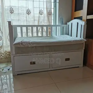 নবজাতক শিশুর জন্য বেবি কট