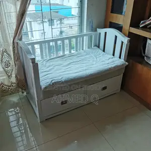 নবজাতক শিশুর জন্য বেবি কট