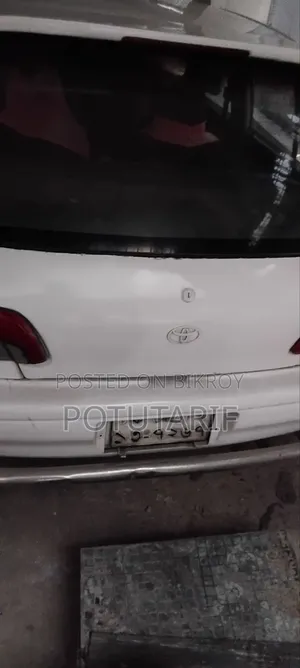 টয়োটা স্টারলেট গ্লানজা ১৯৯৫ সাদা