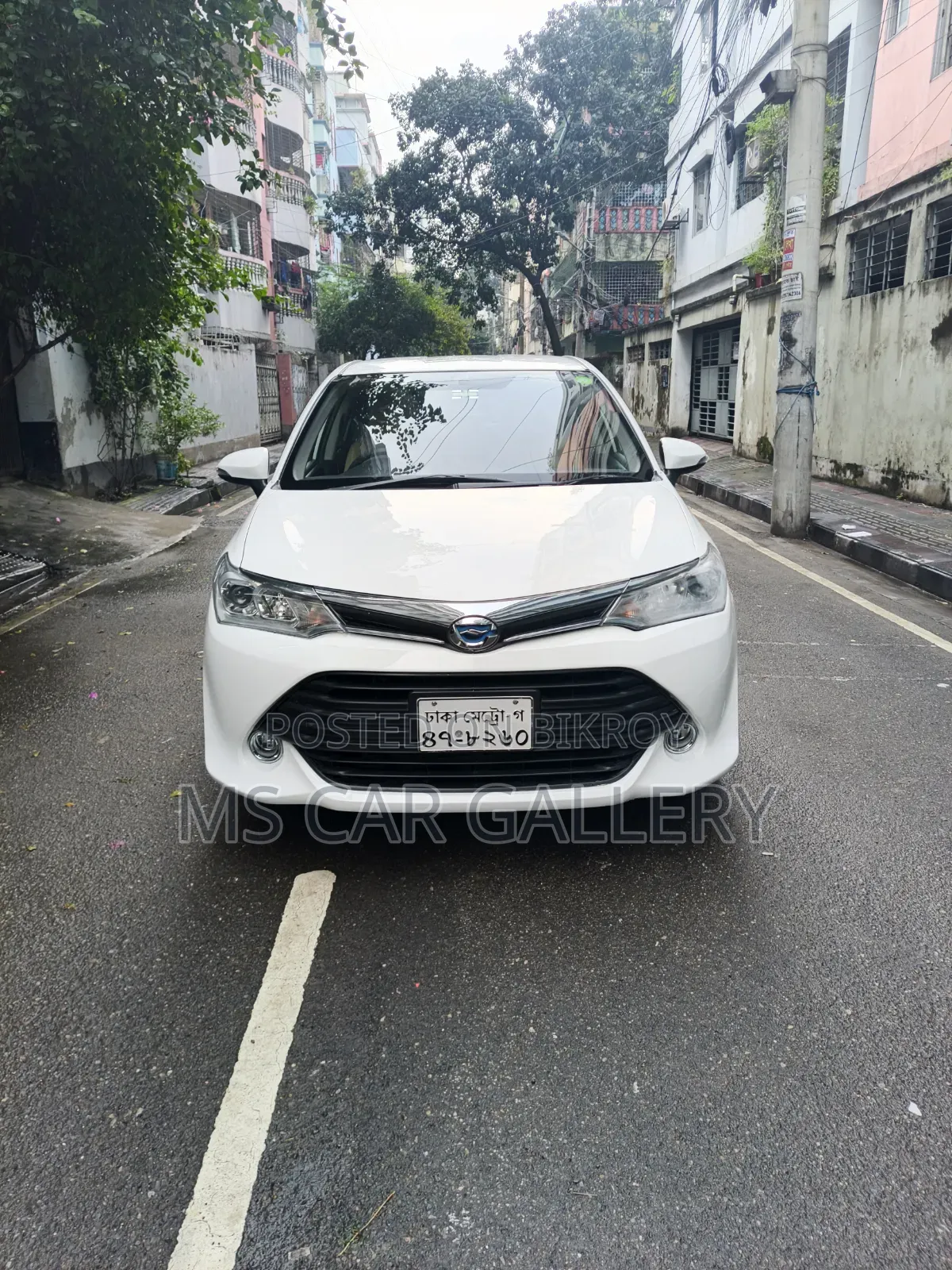 টয়োটা অ্যাক্সিও ১.৫ হাইব্রিড টুডব্লিউডি ২০১৬ সাদা