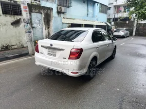 টয়োটা অ্যাক্সিও ১.৫ হাইব্রিড টুডব্লিউডি ২০১৬ সাদা