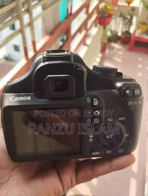 Canon EOS1100D Camera. The camera is very good. It is lying idle at home