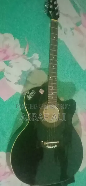 গীটার বিক্রয় হইবে