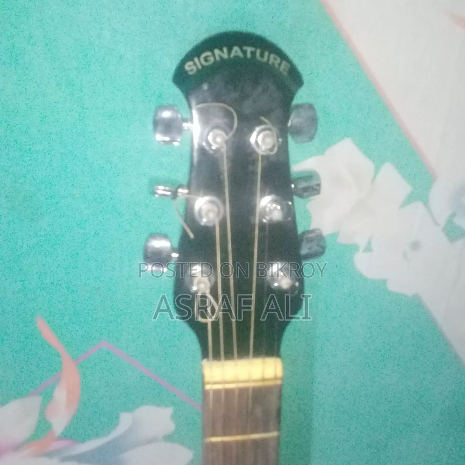 গীটার বিক্রয় হইবে