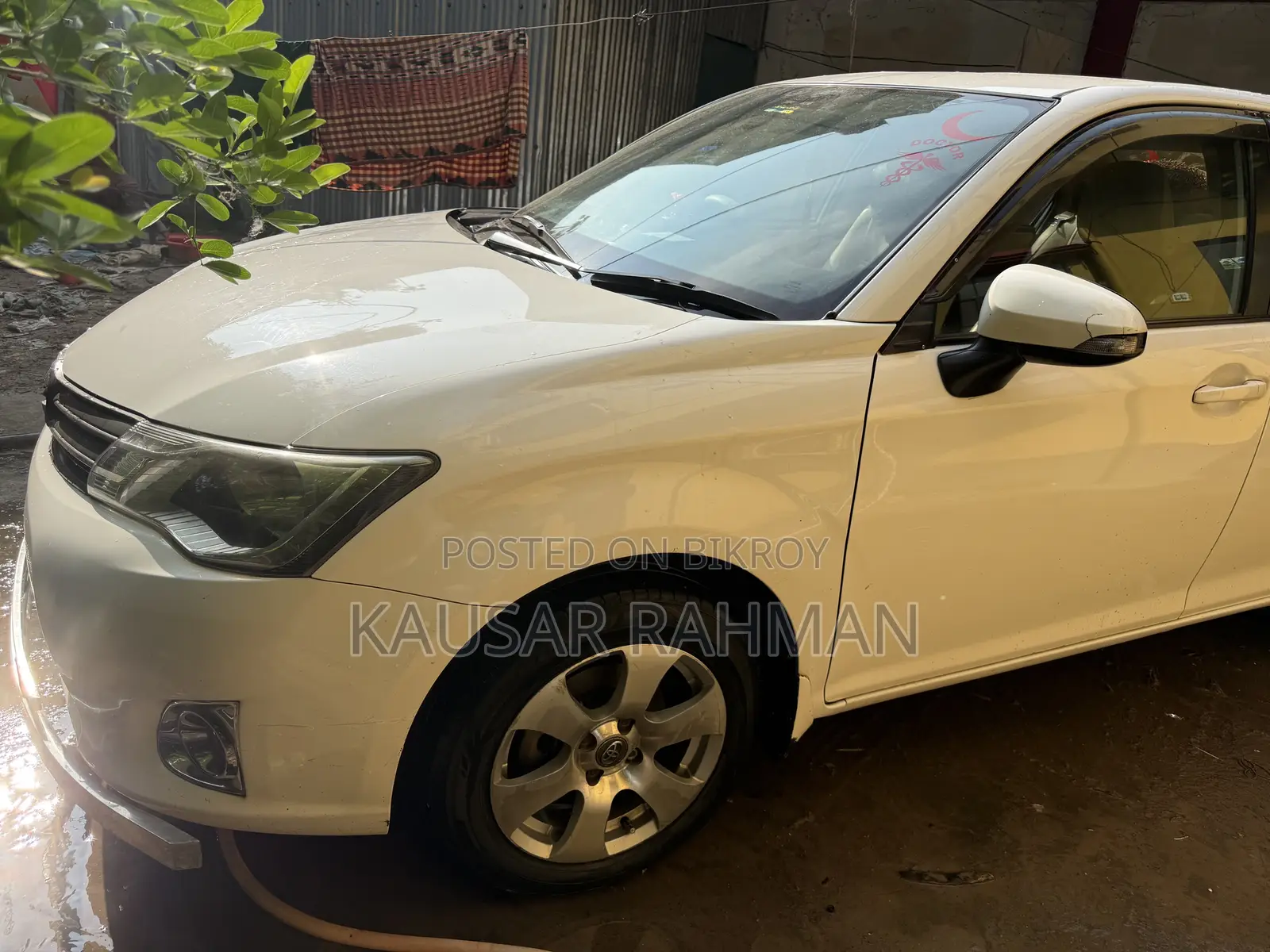 টয়োটা এক্সিও ২০১২ সাদা