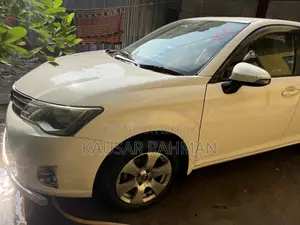 টয়োটা এক্সিও ২০১২ সাদা