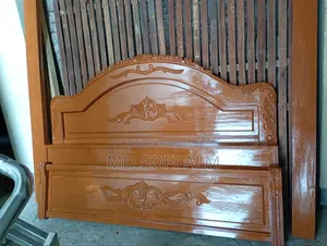 An acacia wood bed will be sold,