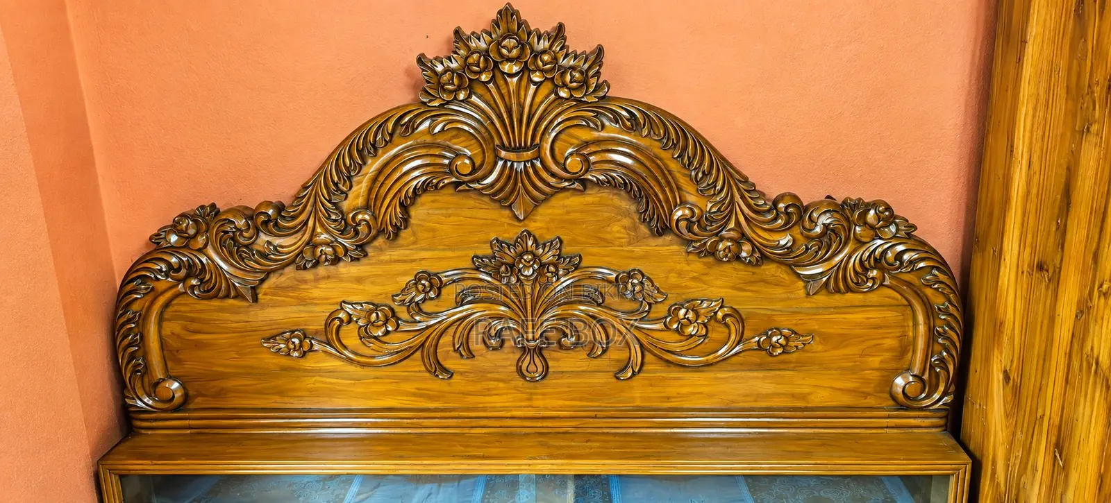 Thick steel showcase, 5 feet 6 inches tall, 5 feet wide. 100% teak wood bed 7 by 6