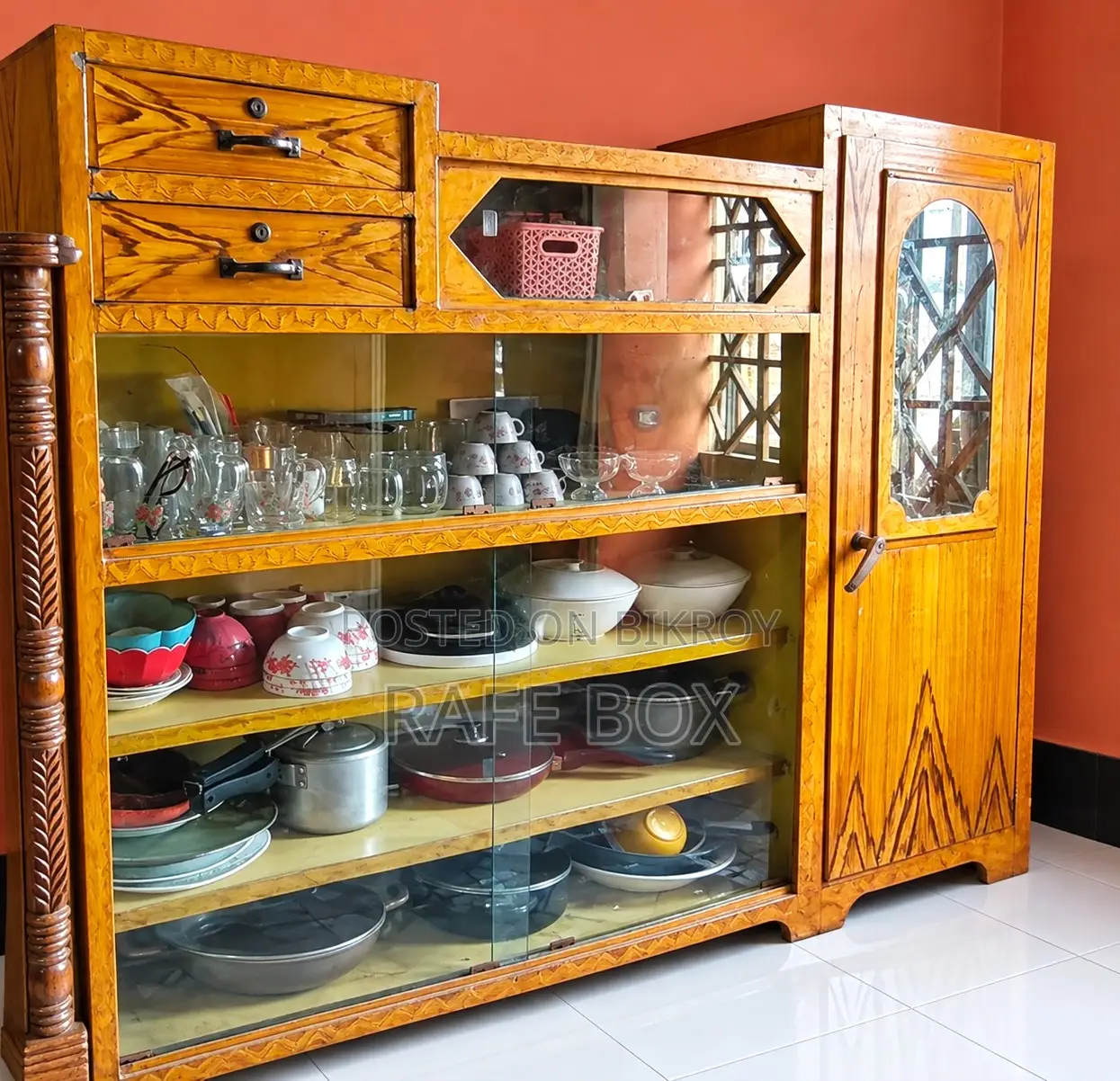 Thick steel showcase, 5 feet 6 inches tall, 5 feet wide. 100% teak wood bed 7 by 6