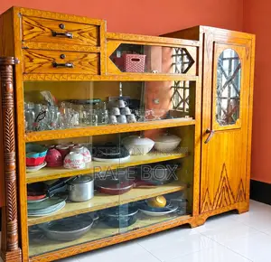 Thick steel showcase, 5 feet 6 inches tall, 5 feet wide. 100% teak wood bed 7 by 6