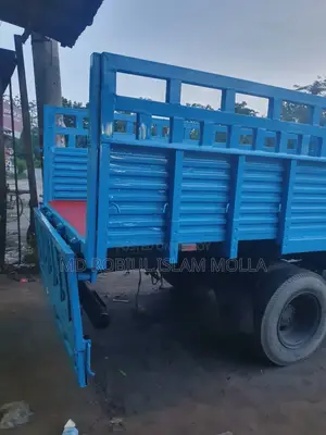 এসএমএল ২০২৩ মিনি ট্রাক