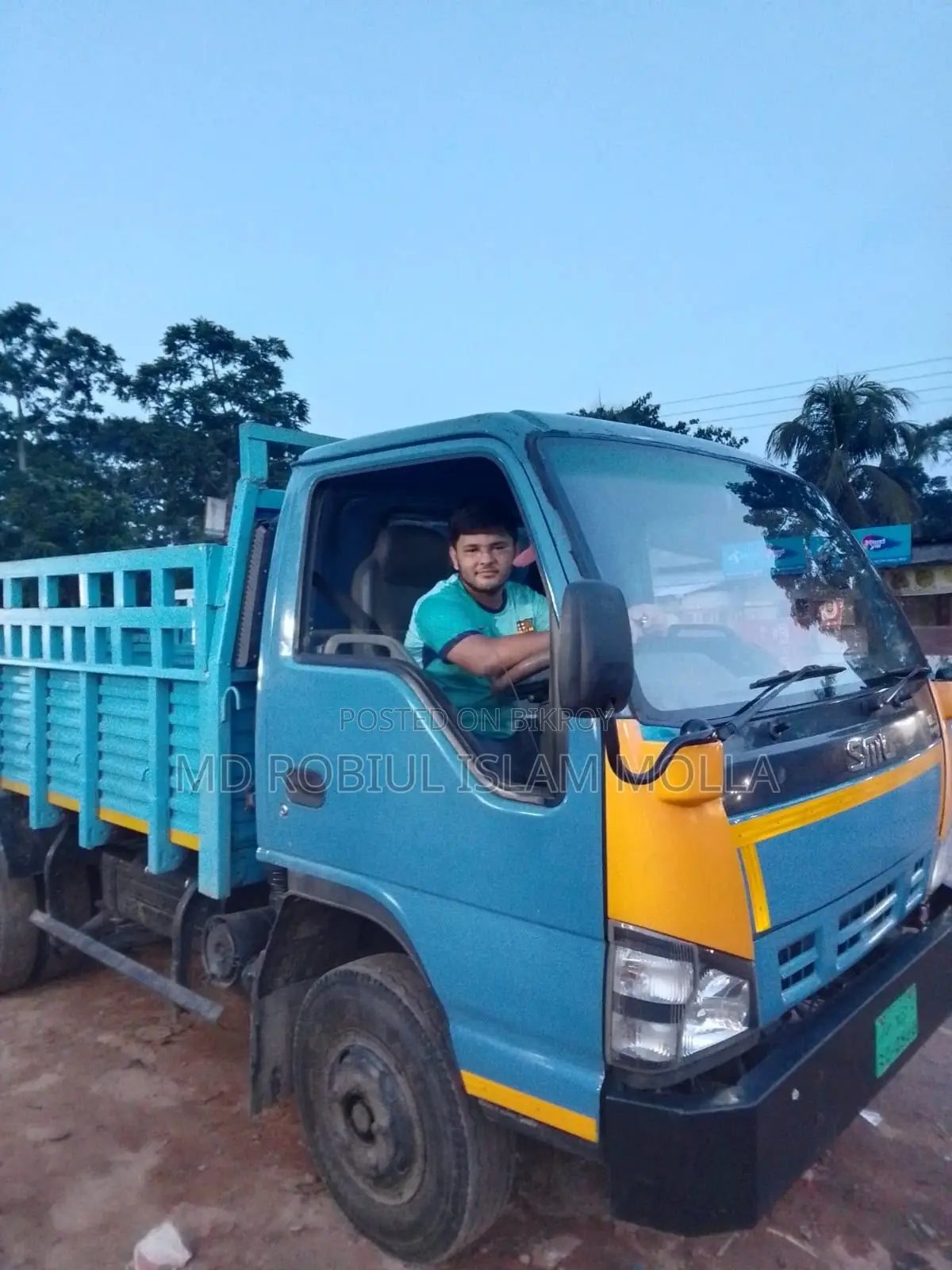 এসএমএল ২০২৩ মিনি ট্রাক