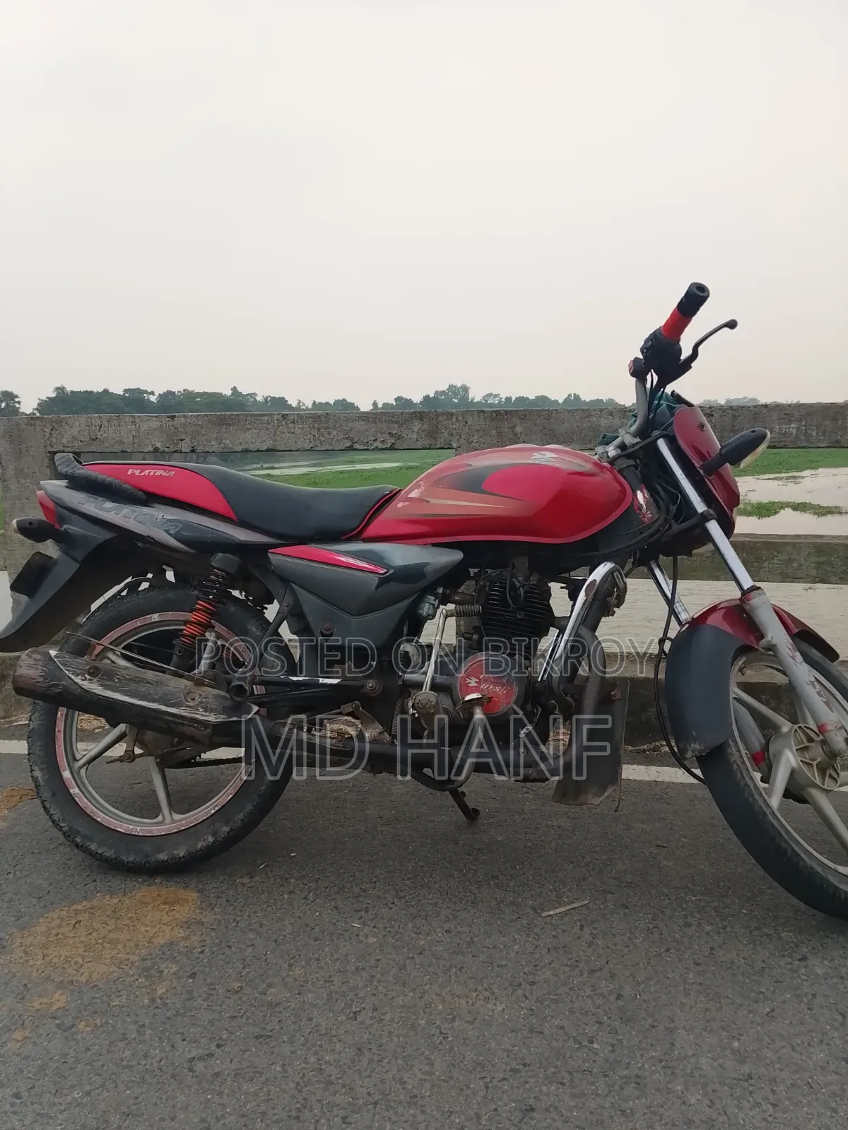 বাজাজ প্লাটিনা ১০০ ২০১২ লাল