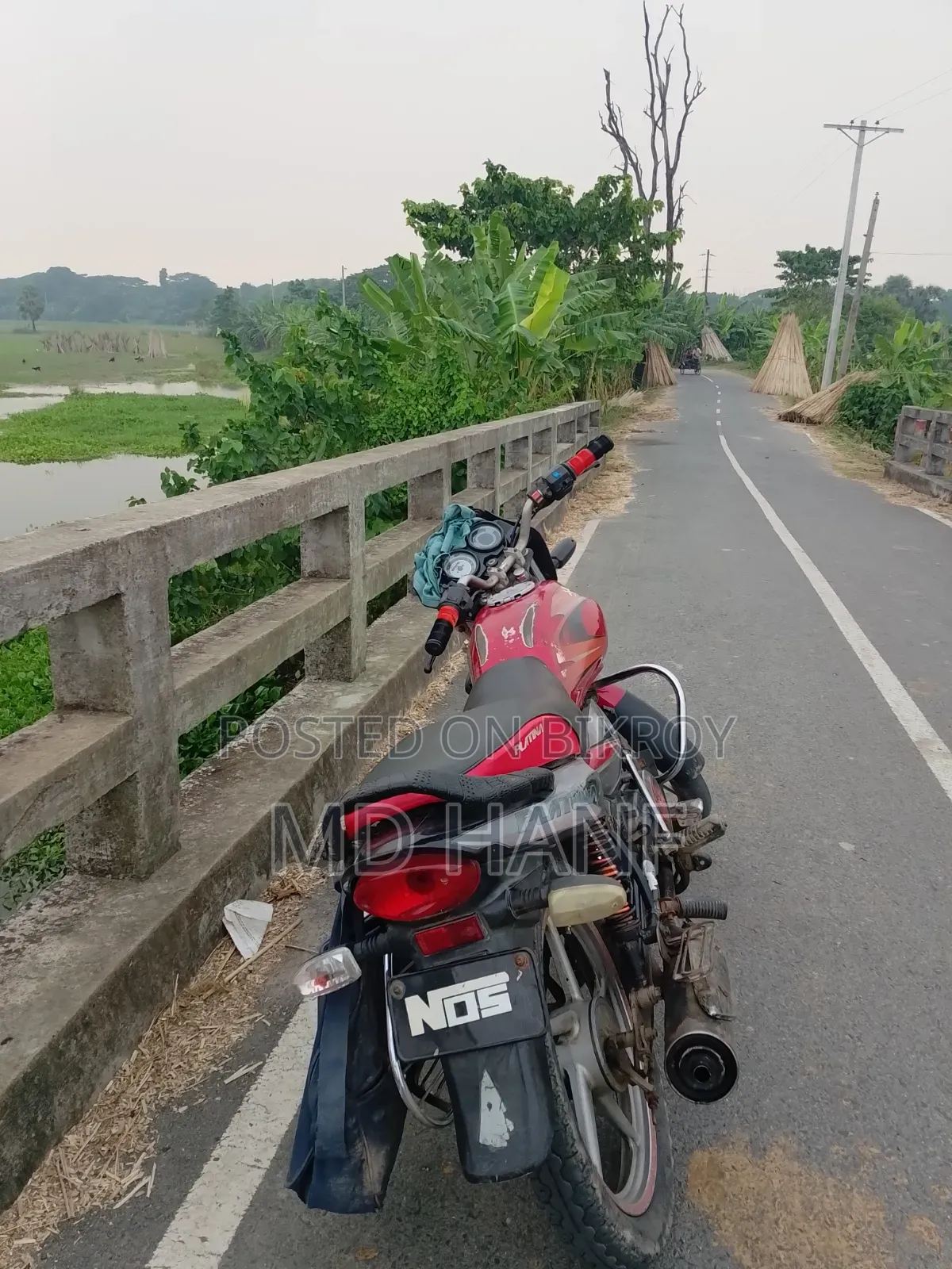 বাজাজ প্লাটিনা ১০০ ২০১২ লাল