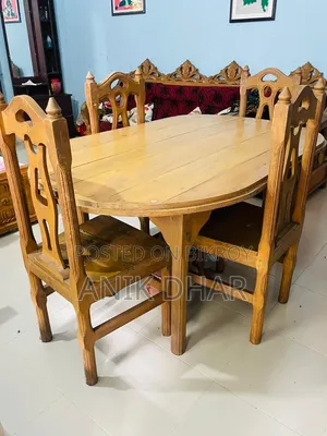 ​৪টি চেয়ারসহ কাঠের ওভাল ডাইনিং টেবিল (৫.৪ ফুট)