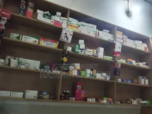 Wooden racks and counter table for pharmacy / shop for sale.