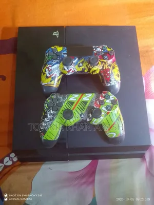 PS 4 PlayStation Dual Game Controller with FIFA 26 game