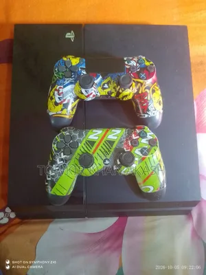 PS 4 PlayStation Dual Game Controller with FIFA 26 game