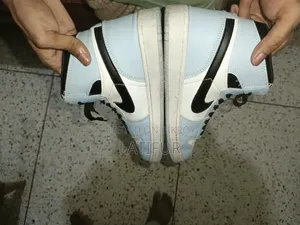University Blue High Neck Jordan 1 Sneaker for Sell