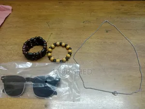 1 Cricket Bat, 2 Men's Bracelets, One Chain and One Sunglass