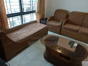 সেন্টার টেবিল এবং ডিভানসহ বেতের সোফা সেট