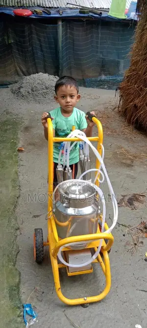 কাউ মিল্কিং মেশিন