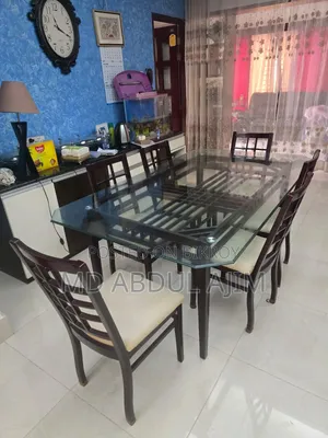 Four Sofa Sets and One Dining Table