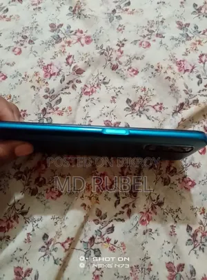 নতুন রিয়েলমি ৭ ৫জি ১২৮ জিবি নীল