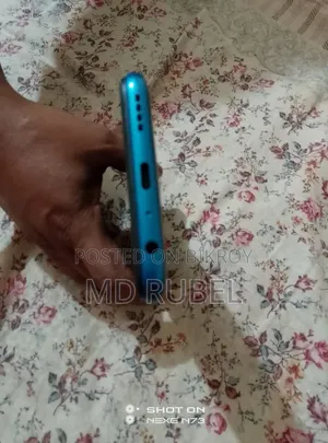 নতুন রিয়েলমি ৭ ৫জি ১২৮ জিবি নীল
