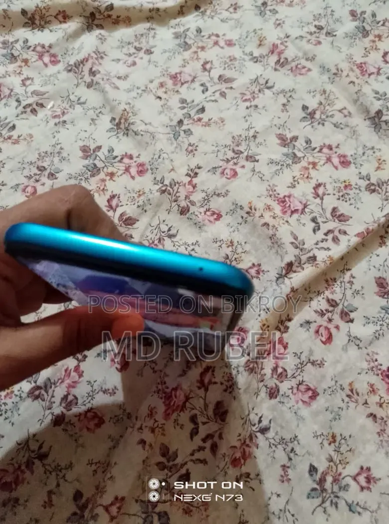 নতুন রিয়েলমি ৭ ৫জি ১২৮ জিবি নীল
