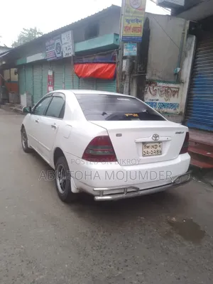 টয়োটা করোল্লা সেডান ২০০১ সাদা