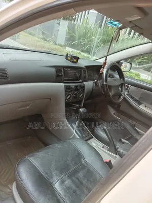 টয়োটা করোল্লা সেডান ২০০১ সাদা