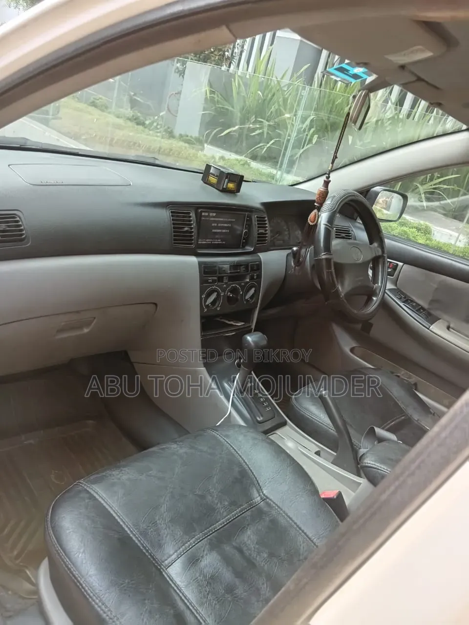টয়োটা করোল্লা সেডান ২০০১ সাদা