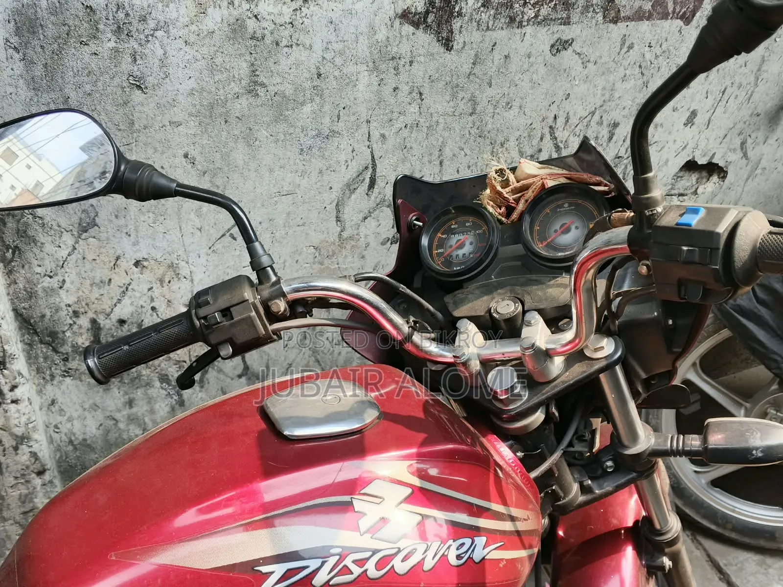 বাজাজ ডিসকভার ১০০ ২০১২ লাল