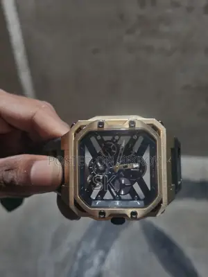 Stylish gold tone Police brand mechanical watch.