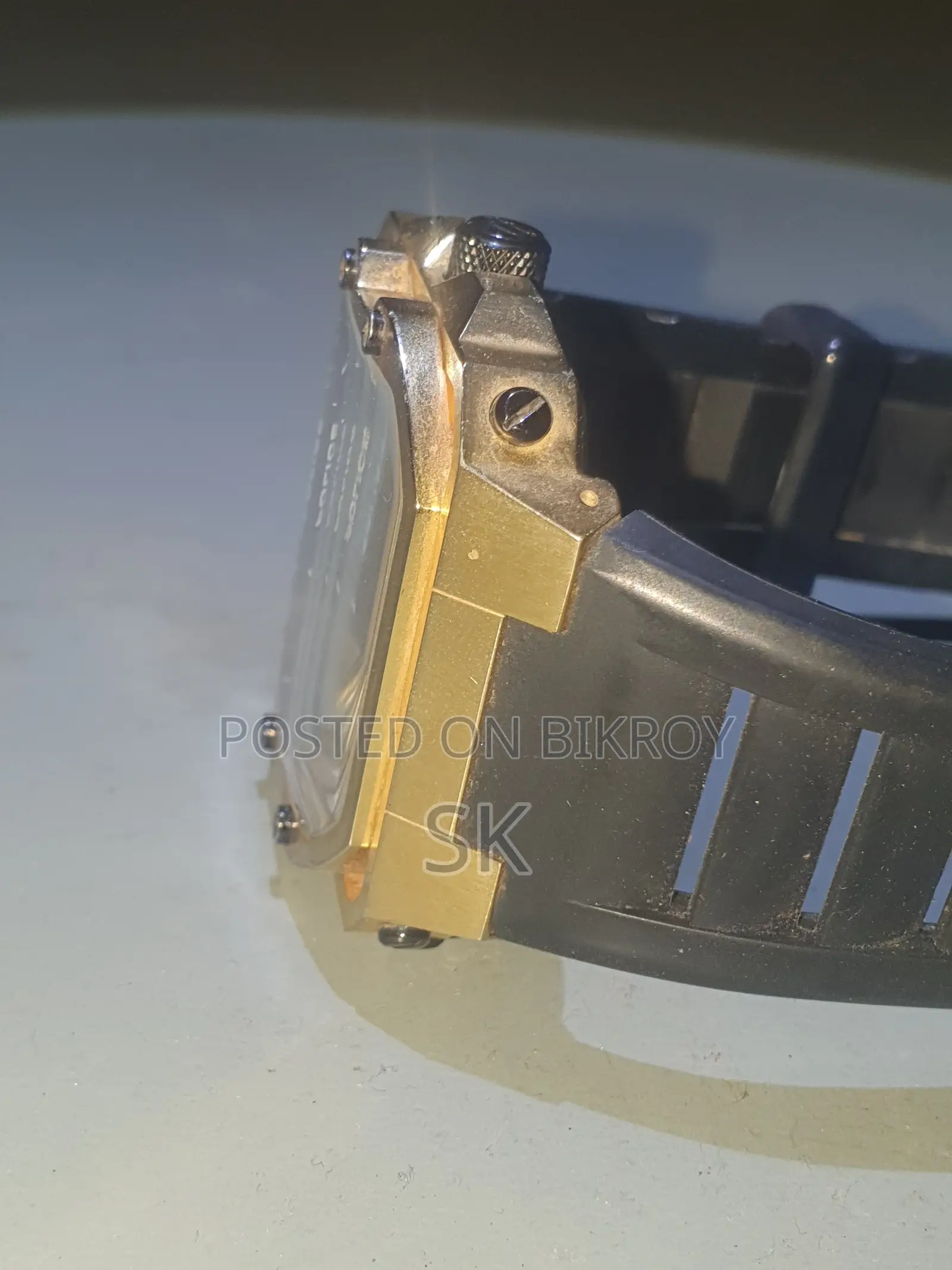 Stylish gold tone Police brand mechanical watch.