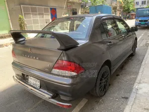 মিতসুবিশি ল্যান্সার ২০০৩ ব্রাউন