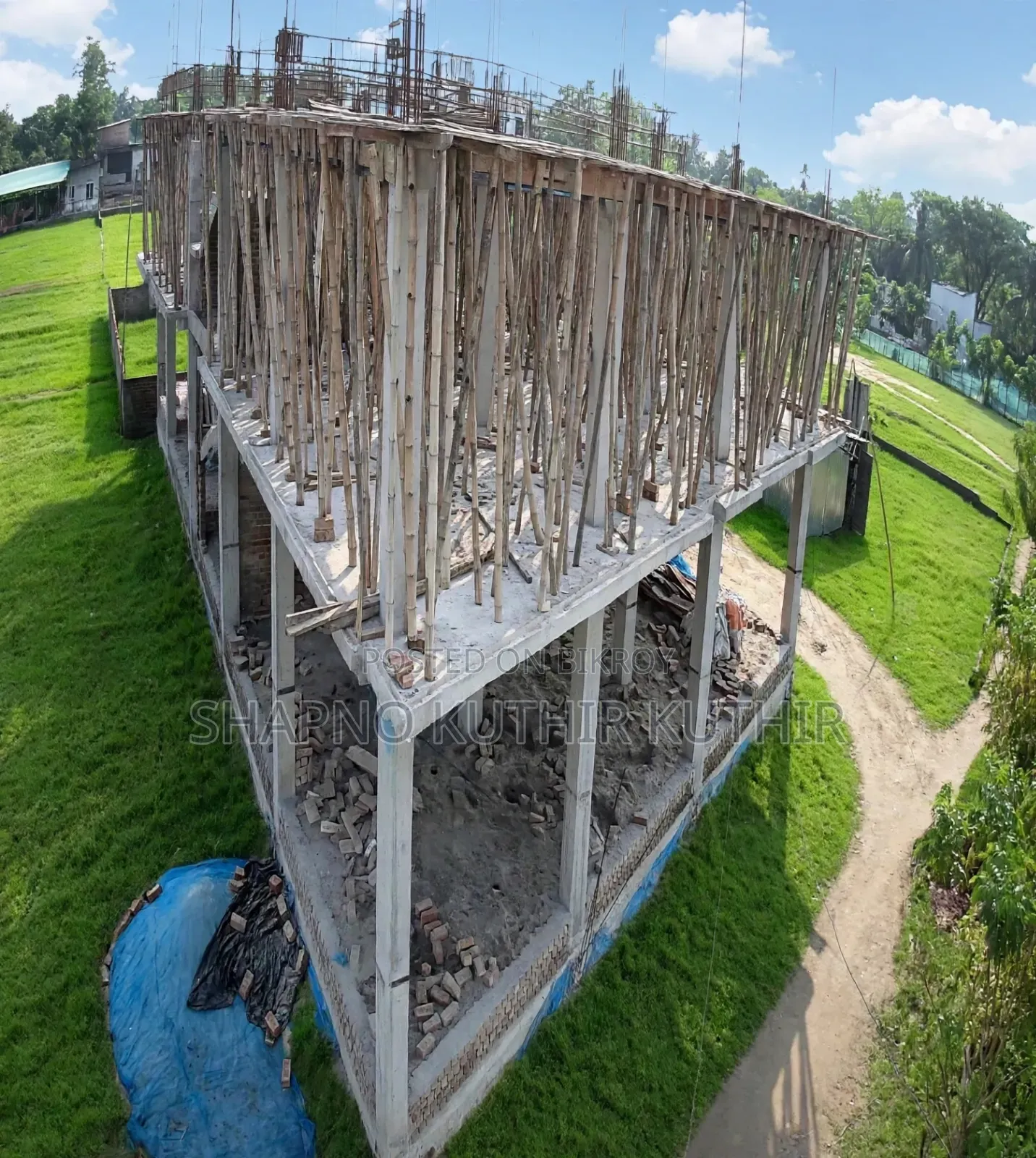 Share sale of a building under construction.