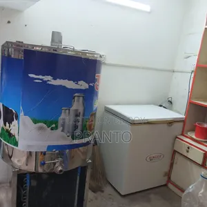 মিল্ক চিলার বা মিল্ক কুলার মেশিন (Milk Chiller / Milk Cooling Tank)